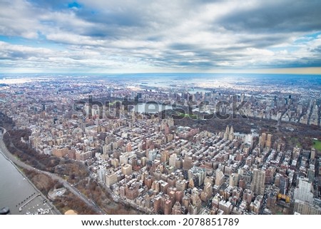 Manhattan helicopter view on a cloudy day. Midtown and Central Park aerial view