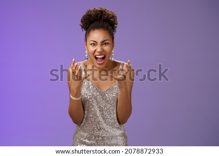 Annoyed bothered african american woman pissed freak-out shouting complaining fed up found out boyfriend cheating her b-day yelling crying clench fists outraged, standing blue background Royalty-Free Stock Photo #2078872933