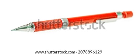 Red ballpoint pen isolated on white background with clipping path