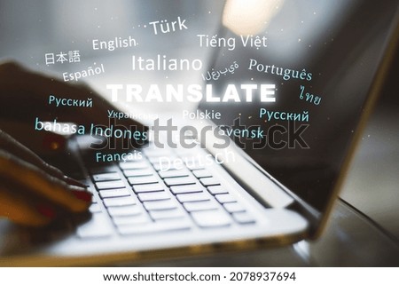 Close up of hands using laptop with abstract text on blurry background. Translation, foreign language, service and education concept. Double exposure