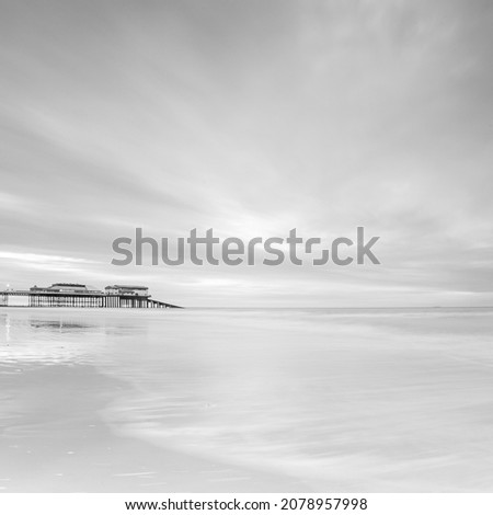 Square format Black and White photograph of Cromer Pier on the north Norfolk coast