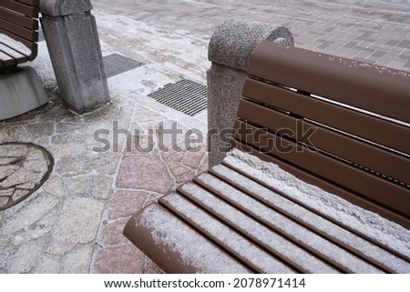 Close up of bench cover by snow in winter, Takayama, Gifu, Japan.
