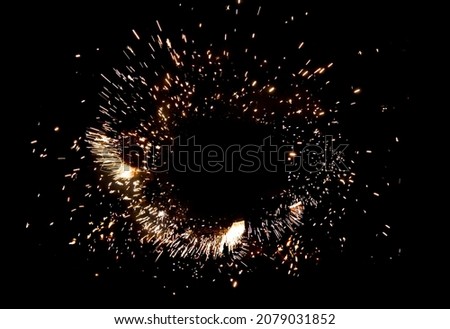 Sparkling burning frame on black background, fire show. Beautiful template for design greeting card, flyer, holiday billboard or Web banner Royalty-Free Stock Photo #2079031852