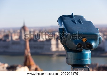 Close up picture of a blue coin-operated binoculars in Budapest, Hungary