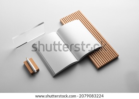 Branding stationery mockup template, with reeded glass and wooden elements, real photo, brochure, booklet, notebook, business card, envelope. Blank isolated on a white background to place your design.