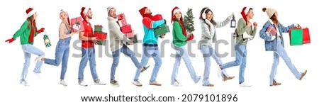 Going young people with Christmas gifts on white background