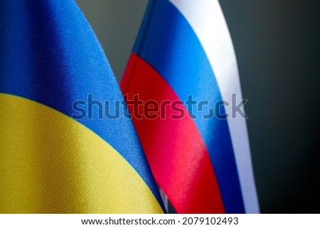 Flags of Russia and Ukraine. Russian-Ukrainian conflict. Royalty-Free Stock Photo #2079102493