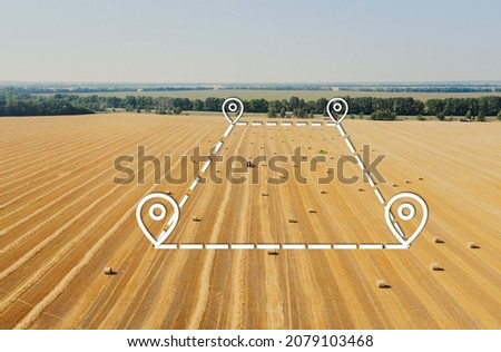 Topographic map of land plot for leasing. Land leasing on a field for agricultural production. Land for agribusiness. Land for sale and investment: Aerial drone shot. Royalty-Free Stock Photo #2079103468