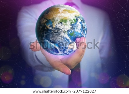 World in our hands. Man holding digital model of Earth, closeup view 