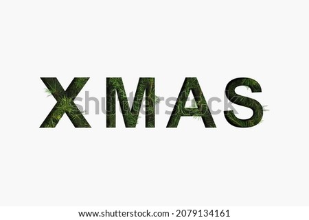 Creative Christmas layout with evergreen pine tree branches on white paper background. Winter holiday minimal concept. Xmas shape flat lay. Copy space.