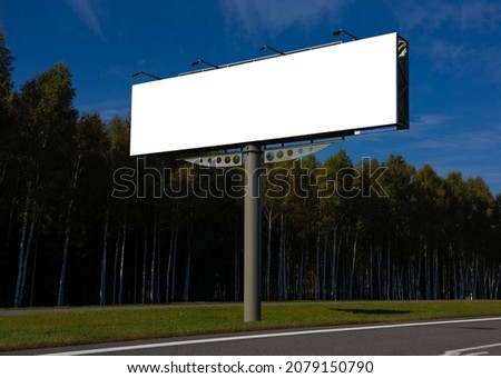 Large white billboards for outdoor advertising along the roads
