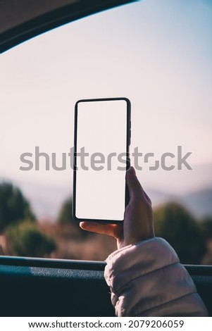 person holding a cell phone
