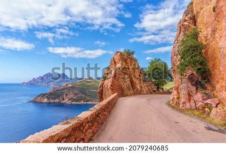 Landscape with mountain road in Calanques de Piana, Corsica island, France Royalty-Free Stock Photo #2079240685