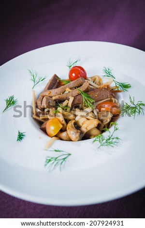 tagliatelle with veal tongue, mushrooms and tomatoes