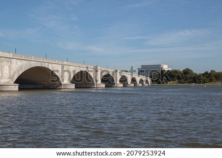 Arlington Memorial Bridge  that crosses the Potomac River at Washington, D.C., the capital of the United States. First proposed in 1886, the bridge went unbuilt for decades 