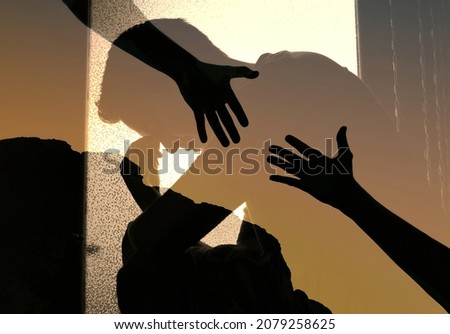 Depressed and sad man needing a helping hand from a friend. 
 Royalty-Free Stock Photo #2079258625