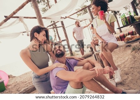 Photo of pretty sweet young friends wear casual clothes talking laughing smiling outside countryside