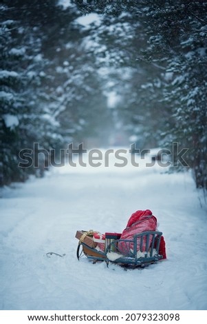  presents in winter snowy forest. Christmas Eve