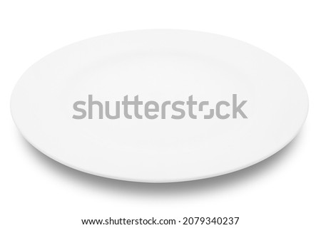 Empty white circle ceramics plate isolated on white background with clipping path.