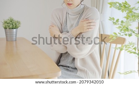 Middle woman in the cold Royalty-Free Stock Photo #2079342010