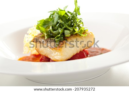 Halibut Fillet with Tomato Sauce and Rucola