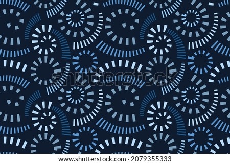 Abstract vector seamless design. Striped curls isolated on a dark blue background. A repeating spiral pattern for use in wallpapers, cards, banners, gift wraps, and more. Royalty-Free Stock Photo #2079355333