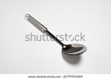 Silver spoon isolated on white background.High-resolution photo.Mock up