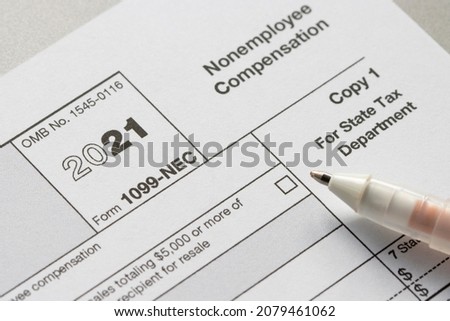 Closeup of Form 1099-NEC, Nonemployee Compensation. The IRS has reintroduced Form 1099-NEC as the new way to report self-employment income instead of Form 1099-MISC as traditionally had been used. Royalty-Free Stock Photo #2079461062