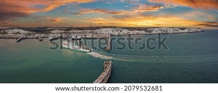 Aerial view of the Dover harbor with many ferries and cruise ships entering and exiting Dover, UK. Royalty-Free Stock Photo #2079532681