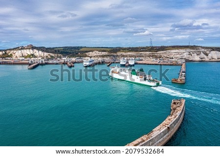 Aerial view of the Dover harbor with many ferries and cruise ships entering and exiting Dover, UK. Royalty-Free Stock Photo #2079532684