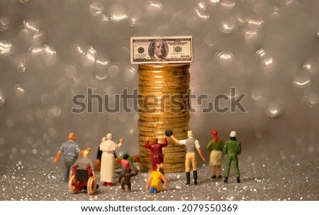 a money pyramid with people