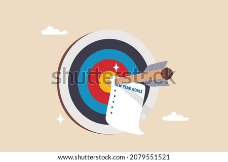 Set new year goals, target or resolution at the beginning of the year, determination or inspiration to improve and success concept, archer arrow with paper writing new year goals on bullseye target. Royalty-Free Stock Photo #2079551521