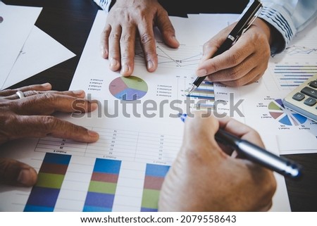 Business team collaboration discussing working analyzing with financial data and marketing growth report graph in team, Discussion and analysis data the charts and graphs. Royalty-Free Stock Photo #2079558643