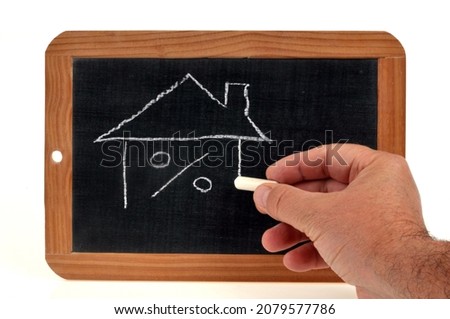 Concept of bank loan rate for buying a house with a school slate