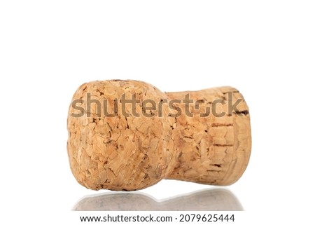 One cork for a bottle of wine, close-up, isolated on white.