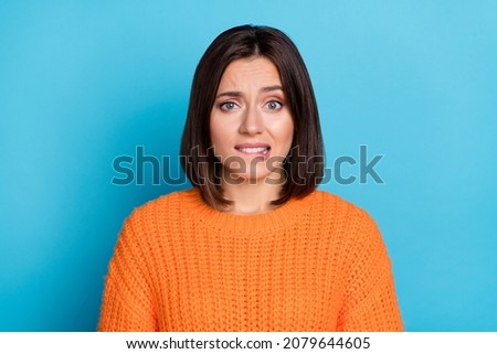 Portrait of attractive unsure uncertain girl biting lip waiting expecting bad news oops isolated over bright blue color background Royalty-Free Stock Photo #2079644605