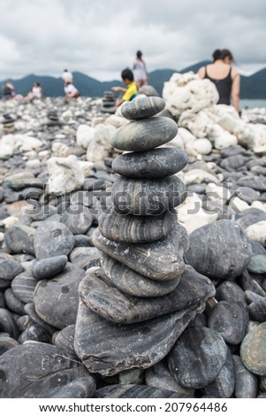 Stack stones in the zen style arrangement in Lipe island, Satun province of Southern Thailand.