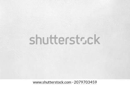 white vintage leather backgroung in light color tone. close up view of suede. blank page of leather texture background with rough and grunge skin, full frame.  Royalty-Free Stock Photo #2079703459