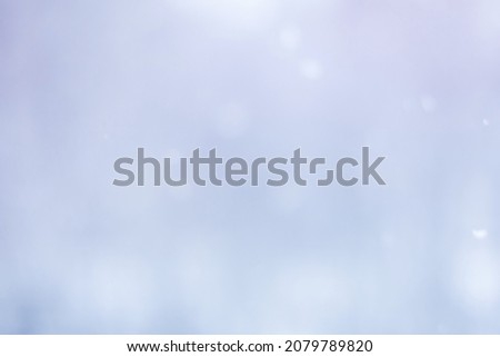 Delicate Winter Nature Blurred Background, closeup. Abstract Beautiful soft texture. Natural light blue defocused backdrop With Copy Space for design