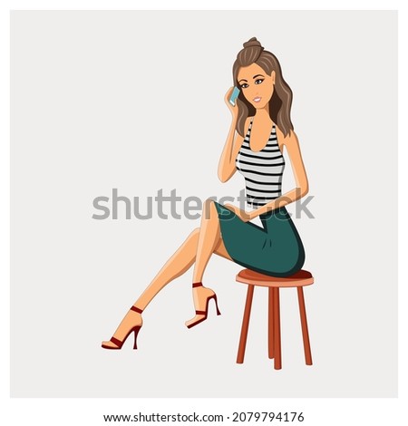 Fashionable woman sitting on a chair and talking on the phone