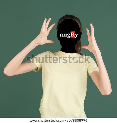 Negative emotions. Contemporary artwork. Portrait of faceless girl with word angry instead face isolated on green background. Human psychology, character traits, mental health concept. Royalty-Free Stock Photo #2079808996