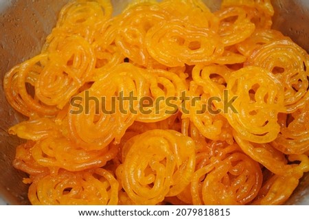 indian dessert orange colored jelebi jangri Royalty-Free Stock Photo #2079818815