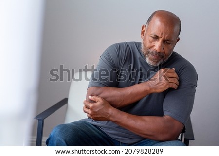 Older man having joint pain. Royalty-Free Stock Photo #2079828289