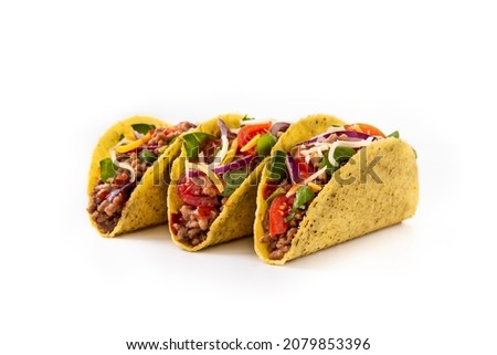 Traditional Mexican tacos with meat and vegetables isolated on white background Royalty-Free Stock Photo #2079853396