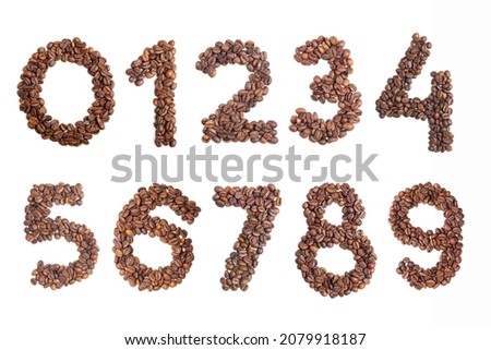 Numbers 1, 2, 3, 4, 5, 6, 7, 8, 9, 0 made from roasted coffee beans on white isolated background. Element for decoration. View from above. Numbers from 1 to 9. Royalty-Free Stock Photo #2079918187
