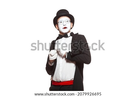 Portrait of a male mime artist performing, isolated on white background. Symbol of fright, fear, scared, horror movie