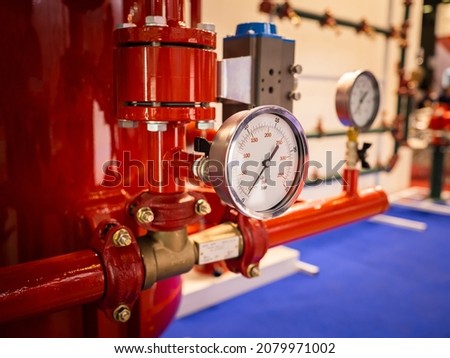 Modern fire protection system. Fire protection system in red. Flame extinguishing apparatus at enterprise. Indoor flame detection and extinguishing. Fire prevention equipment. Pressure Sensors Royalty-Free Stock Photo #2079971002