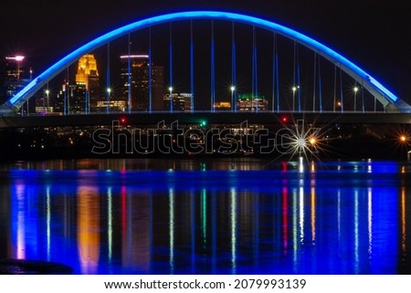Lowry ave. bridge at night with the Minneapolis skyline