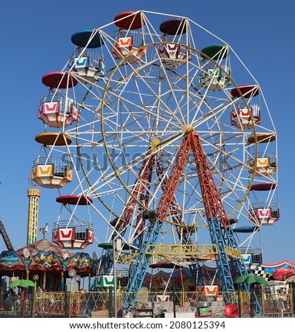 Photo of fun fair with sky background