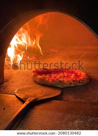 wood-fired pizza, classic Italian recipe Royalty-Free Stock Photo #2080130482